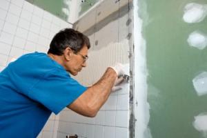 a Fremont Handyman installs a full shower tile surround